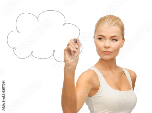 Photo: woman drawing cloud in the air woman drawing cloud in the air