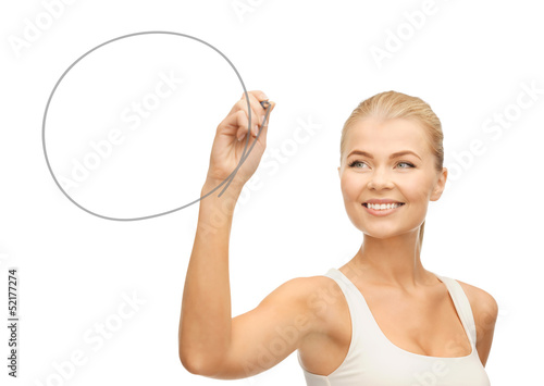 Photo: woman drawing round shape woman drawing round shape