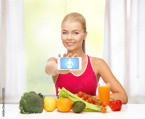Photo: woman with fruits, vegetables and smartphone woman with fruits, vegetables and smartphone