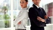 Business people standing together back to back