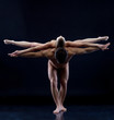 Image of two naked acrobats showing trick Image of two naked acrobats showing trick