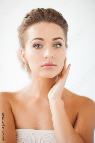 Photo: woman with diamond earrings woman with diamond earrings