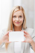 woman with blank business or name card