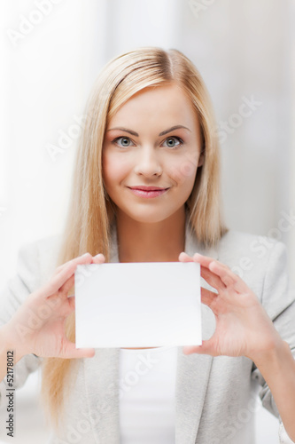 Photo: woman with blank business or name card woman with blank business or name card