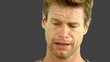 Video: Man crying on grey screen Man crying on grey screen