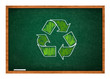 Photo: recycle symbol on green chalkboard recycle symbol on green chalkboard