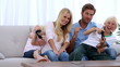 Family playing video games together