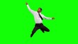 Businessman listening to music while jumping up disco dancing