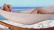 Attractive woman in a hammock