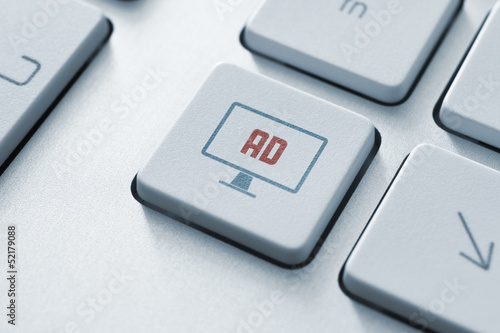 Photo: Internet advertising button concept Internet advertising button concept