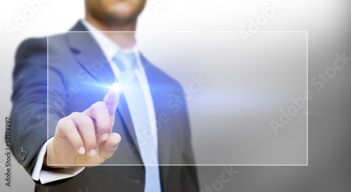 Photo: Businessman touching tactile interface Businessman touching tactile interface