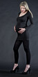 pregnant woman wearing black clothes and pumps