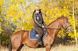 equestrian on horseback in autumnal nature