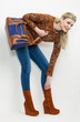 standing woman wearing fashionable platform brown shoes with a h