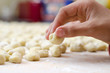 Hand preparing homemade italian gnocchi