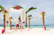 young loving couple on wedding day in beautiful wedding setup wi