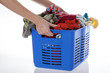 Hands with basket of laundry