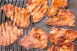 Photo: Pork meat grilled on barbecue Pork meat grilled on barbecue