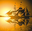 pirates ship against sunset