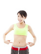 Photo: happy young woman doing exercise and point his waist happy young woman doing exercise and point his waist