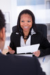 Photo: Two Business Colleague Discussing Two Business Colleague Discussing