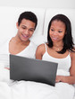 Couple Looking At  The Laptop
