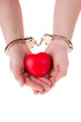 Female hands  holding red heart