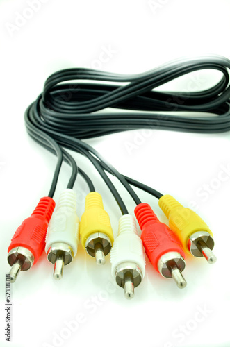 Photo: Close-up view of audio and video cables. Isolated on white.. Close-up view of audio and video cables. Isolated on white..