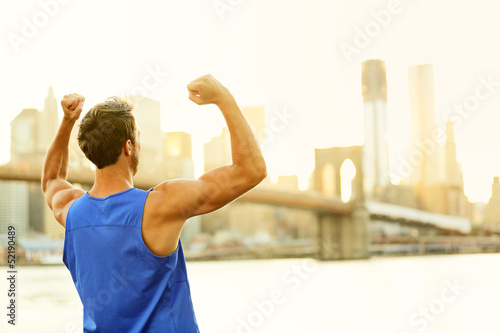 Photo: Winning cheering success fitness man in New York Winning cheering success fitness man in New York