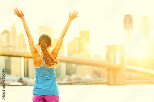 Photo: Happy cheering woman in New York City Happy cheering woman in New York City