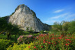 Carved buddha image on the cliff at Khao Chee Jan, Pattaya, Thai