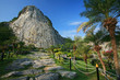 Carved buddha image on the cliff at Khao Chee Jan, Pattaya, Thai