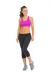 Full length portrait of fitness woman looking on ccopy space