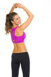 Happy fitness young woman making exercise