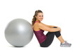 Smiling fitness young woman sitting near fitness ball