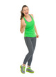 Photo: Full length portrait of happy fitness woman rejoicing success Full length portrait of happy fitness woman rejoicing success
