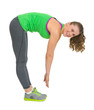 Smiling healthy young woman stretching
