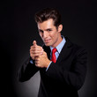 business man lighting one up