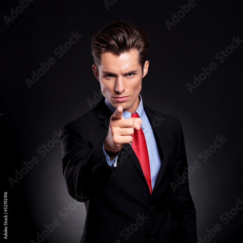 Photo: business man pointing at you business man pointing at you