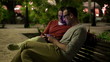 Young male friends with smartphone in the city