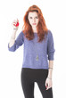 Mad and upset young woman holding red ball