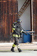 brave firefighters with oxygen tank fire during an exercise held