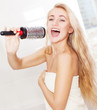 Young woman in the morning at bathroom