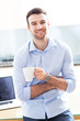 Photo: Man drinking coffee Man drinking coffee