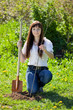 female gardener setting tree