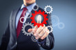 Businessman with cogwheels