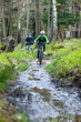 Healthy lifestyle - teenage girl and boy biking