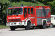 fire truck arrives in speed to put out the fire in the city