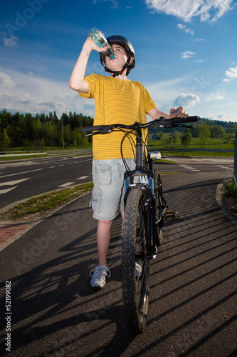 Photo: Healthy lifestyle - teenage boy biking Healthy lifestyle - teenage boy biking