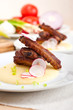 pork ribs on polenta corn cream bed